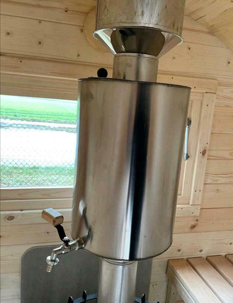 Pirts ūdens uzsildes boileris kas iestrādāts skurstenī